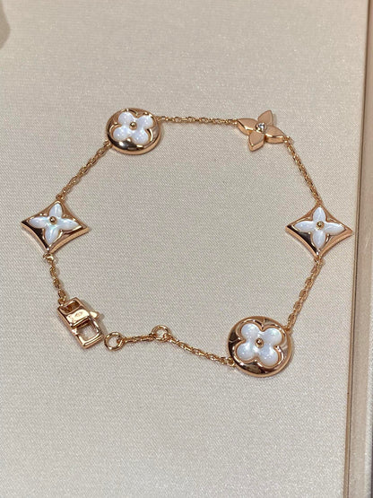 [LUCKY LOVE]STAR AND SUN 5 MOTIF MOP PINK GOLD BRACELET
