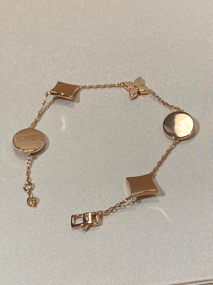 [LUCKY LOVE]STAR AND SUN 5 MOTIF MOP PINK GOLD BRACELET