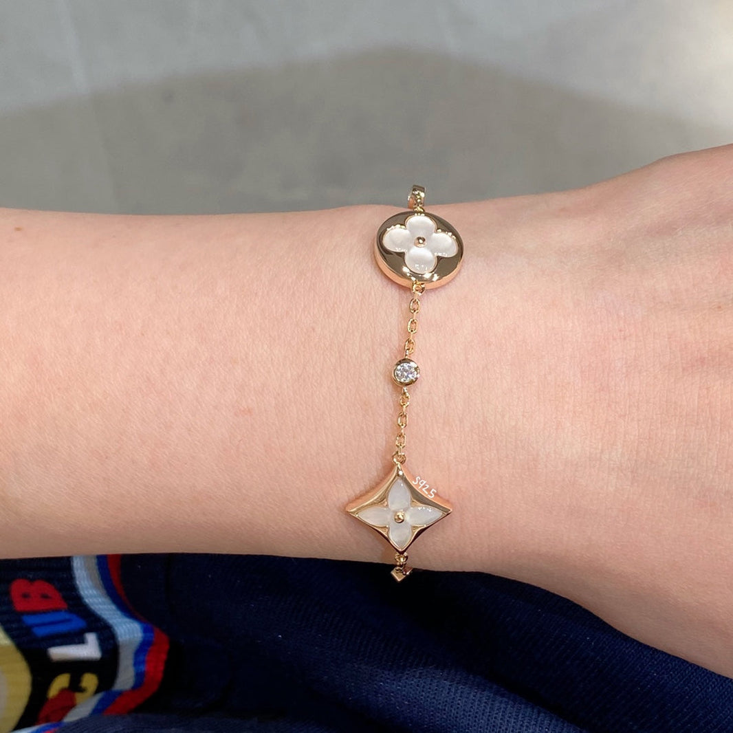 [LUCKY LOVE]STAR AND SUN 4 MOTIF WHITE MOP PINK GOLD BRACELET